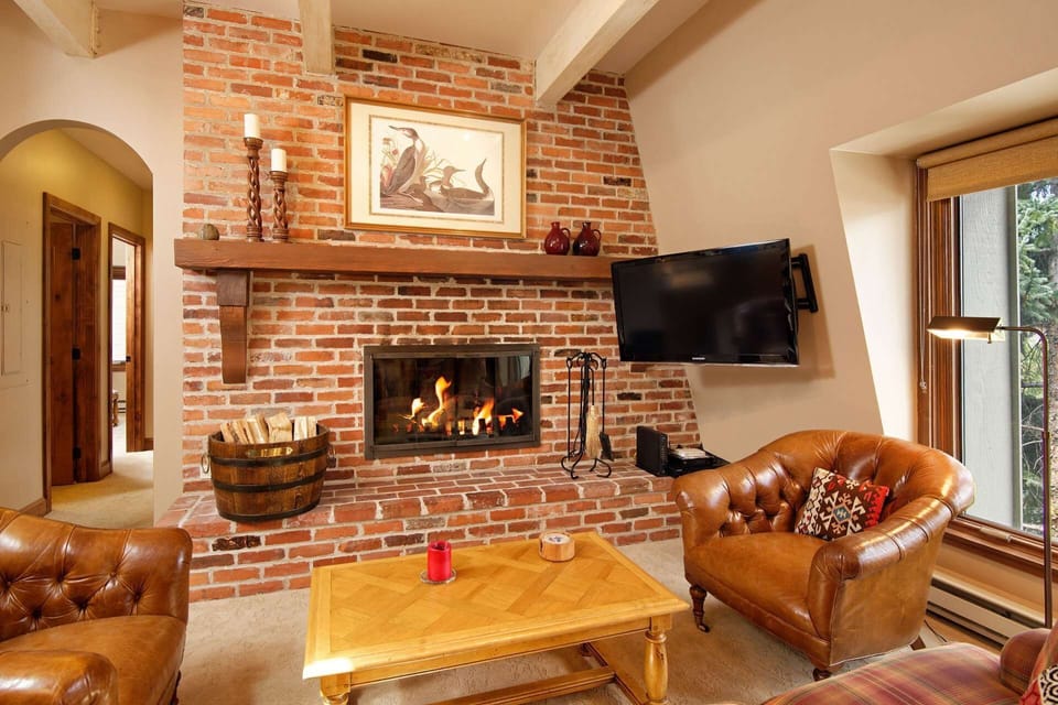 Downtown location offers a wood burning fireplace is an enjoyable amenity during the winter or on cool summer nights in the mountains.