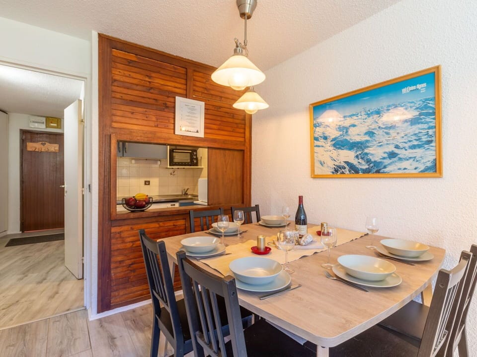 Table, Furniture, Property, Cabinetry, Chair, Wood, Interior Design, Wood Stain, Tableware, Wall