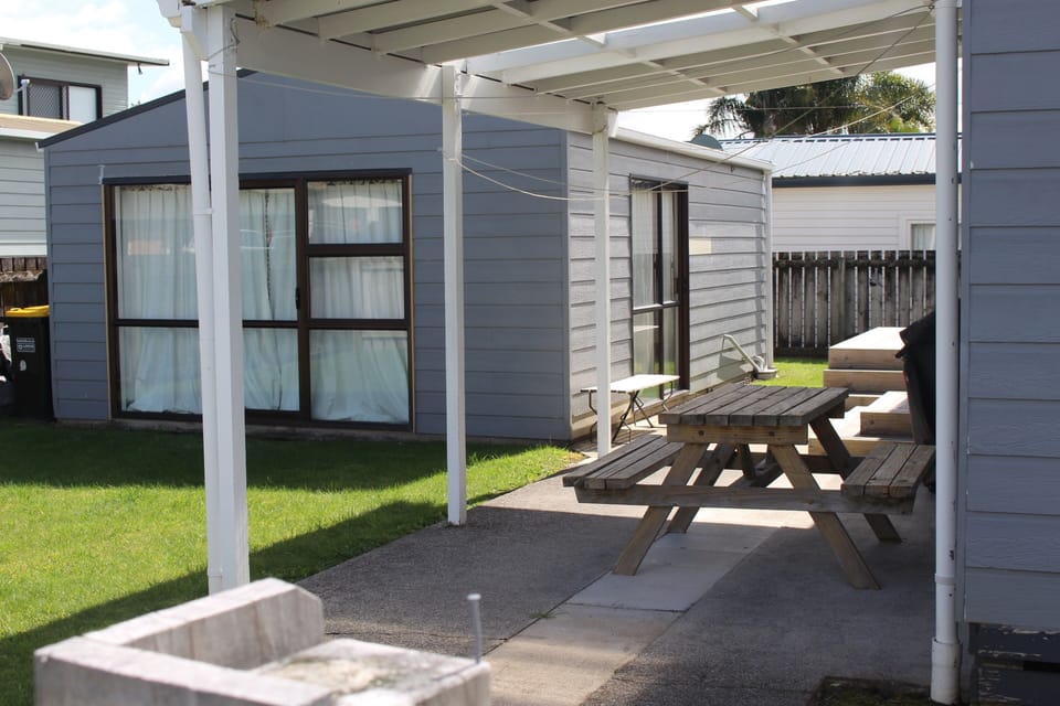 Rear of bach, carport and sleepout 