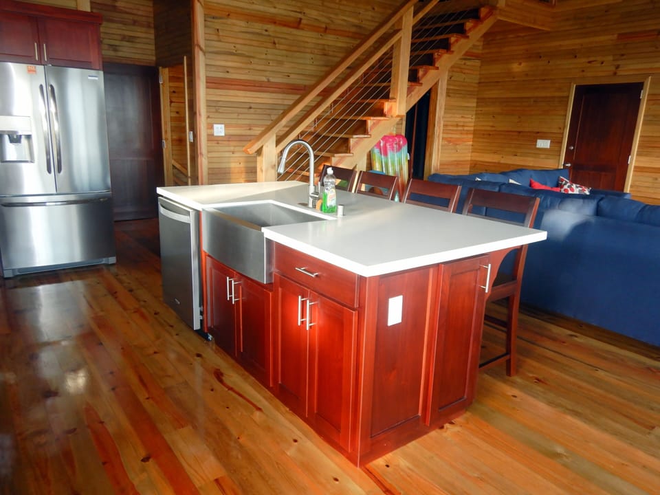 Kitchen island - dishwasher, large sink, bar seating and more storage cabinets