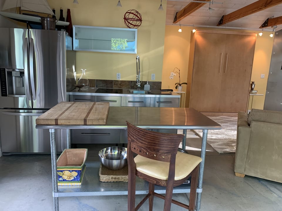 Fridge with 2 ice makers, 2 burner induction stove and large work island.