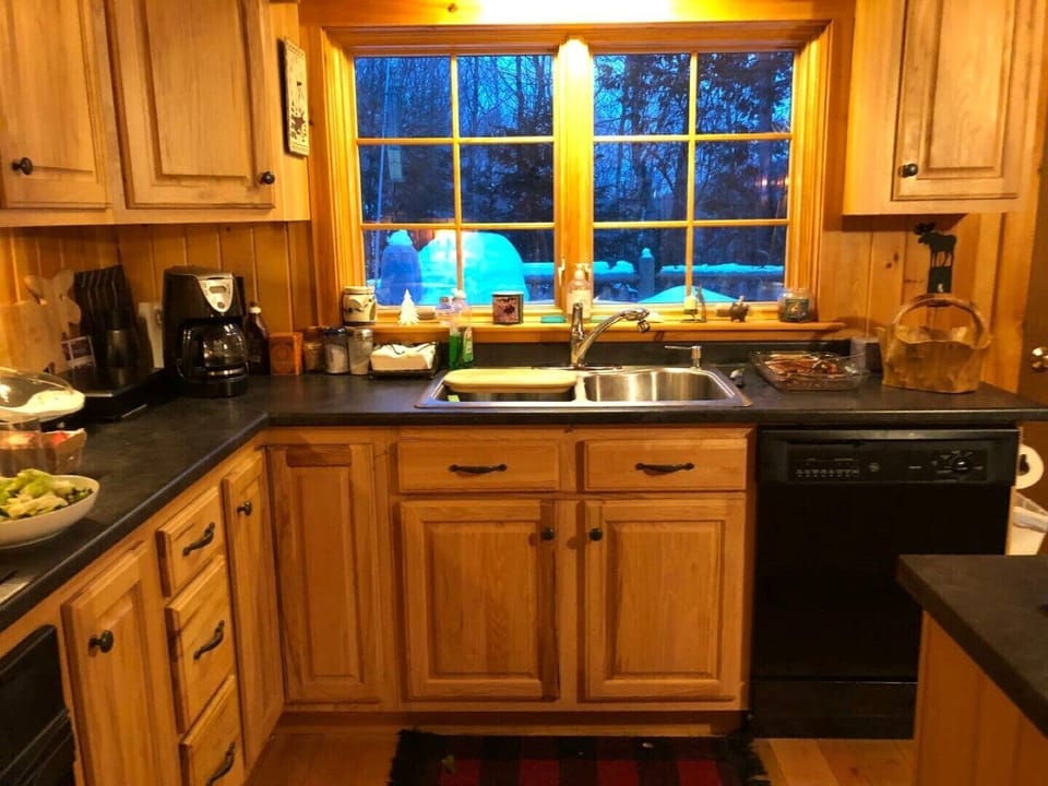 Full kitchen with indoor grill and many other amenities for family gatherings.