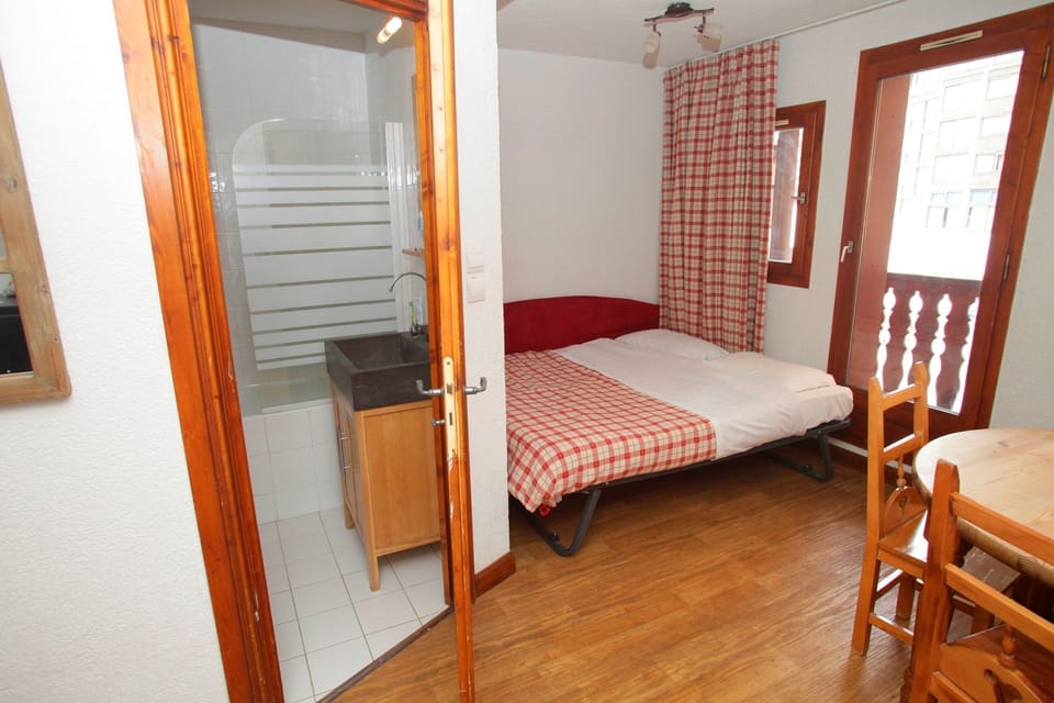 The living area sleeps 2 guests in a variety of bedding options!