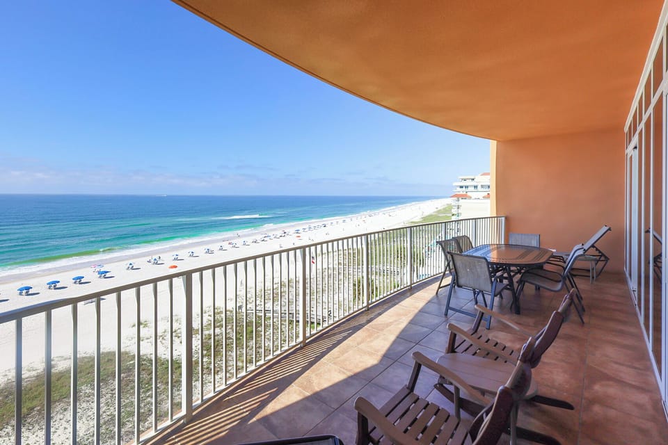 Relax on the spacious balcony, soaking in the gentle breeze and captivating views of the beach