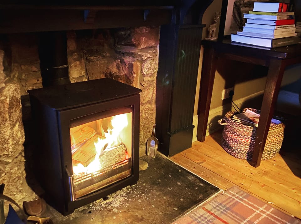 Living room with Wood stove. Cozy & comfy. Perfect evening hideaway! 