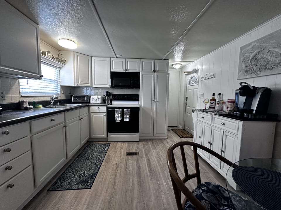 Kitchen area with all the amenities you would need to make your meal. 
