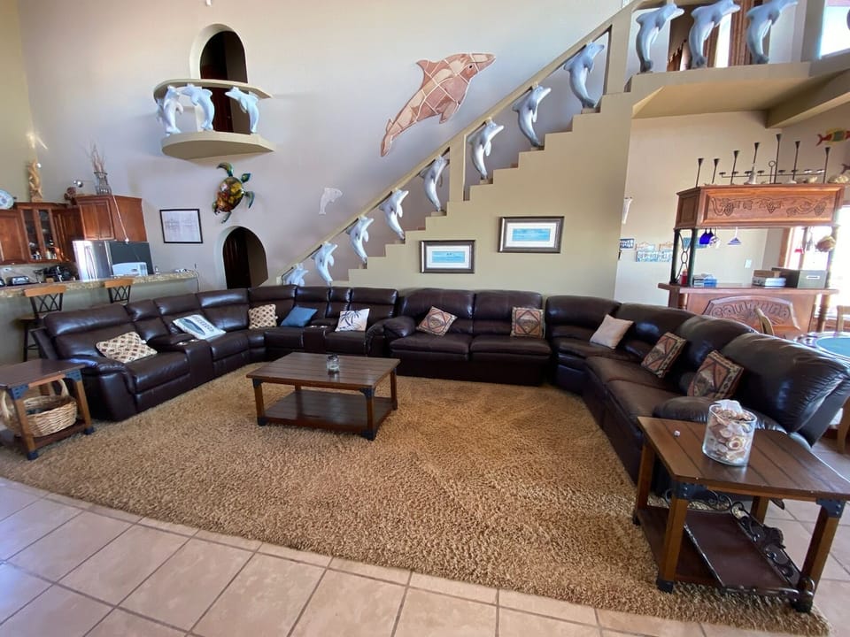 Very Large Sectional watching flat screen TV