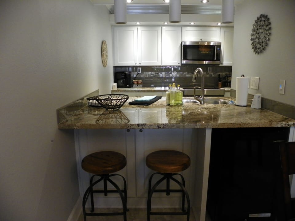 Breakfast bar seats two.  Wine fridge to keep your wine just right.