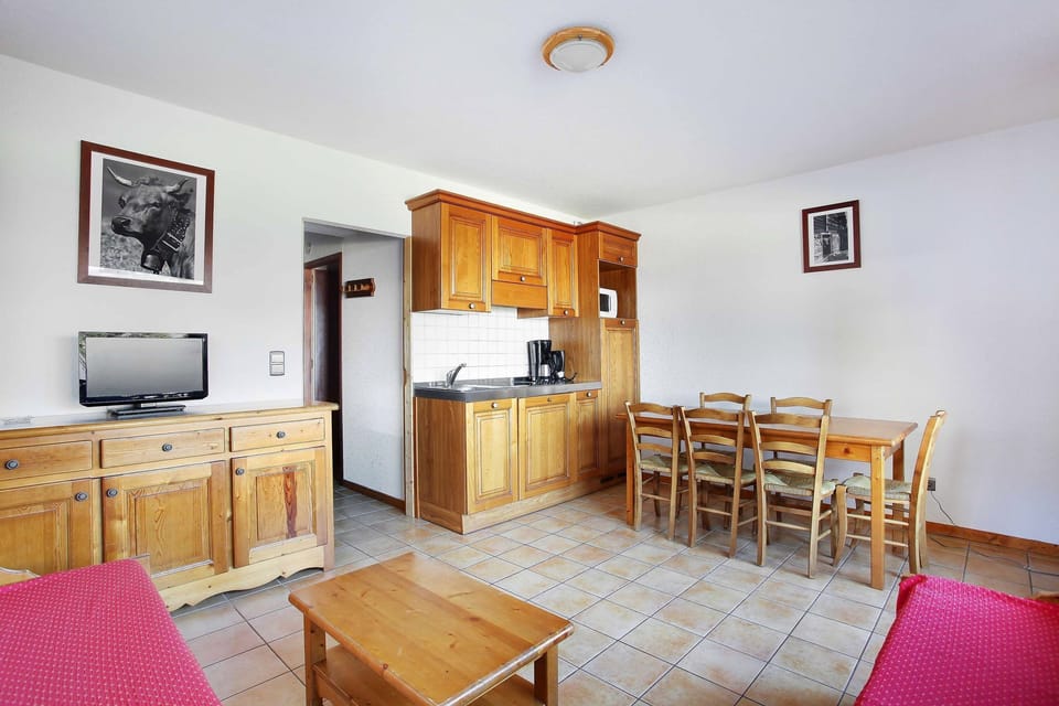 Prepare meals in the kitchenette and enjoy them at the dining table.