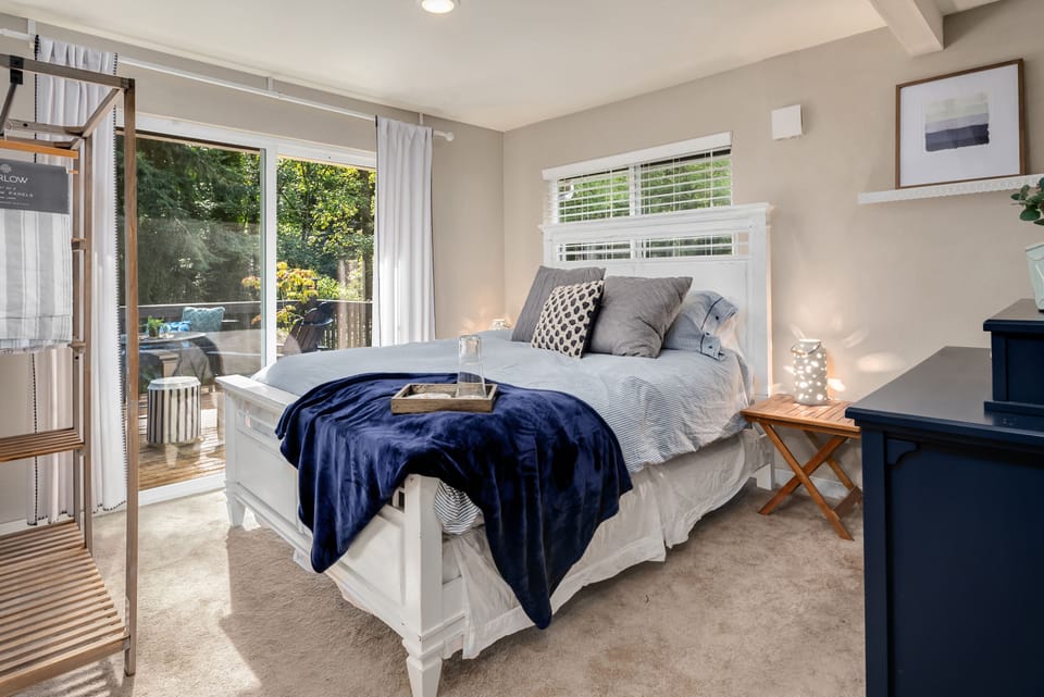 Bedroom 1 with queen bed and adjoining bathroom 