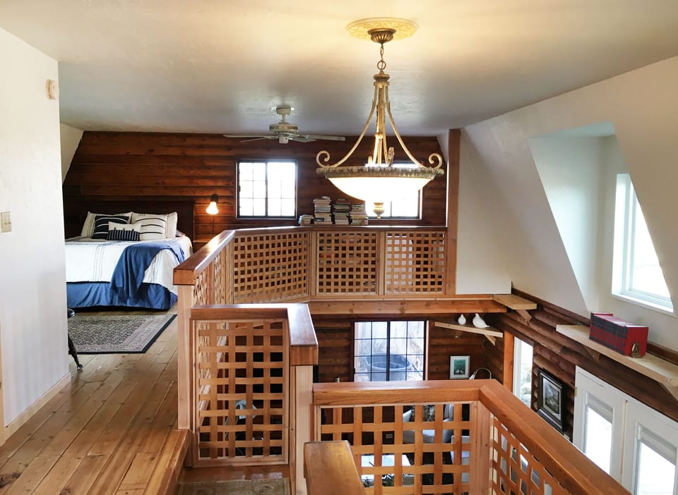 North loft bedroom view as you walk upstairs.