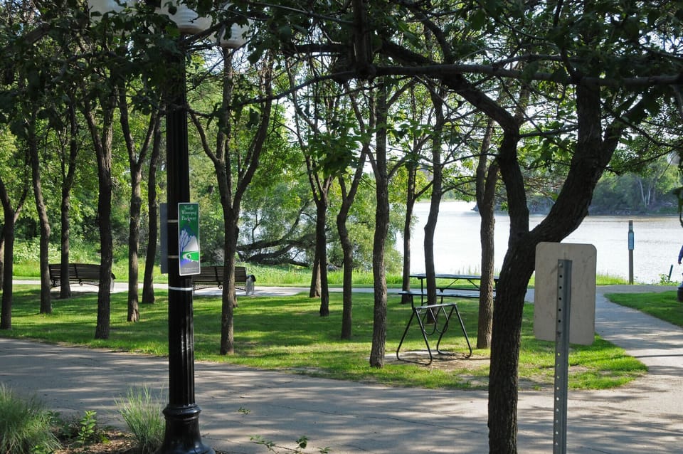 Seating and picnic benches along the path