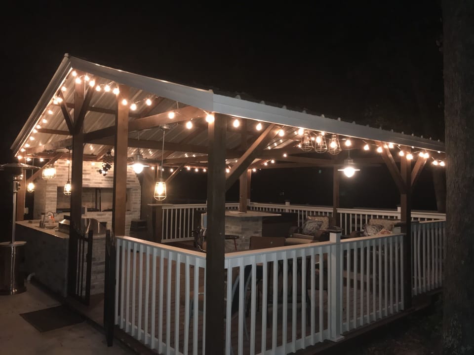 A great spa on a nice patio cover with a new outdoor kitchen with two grills