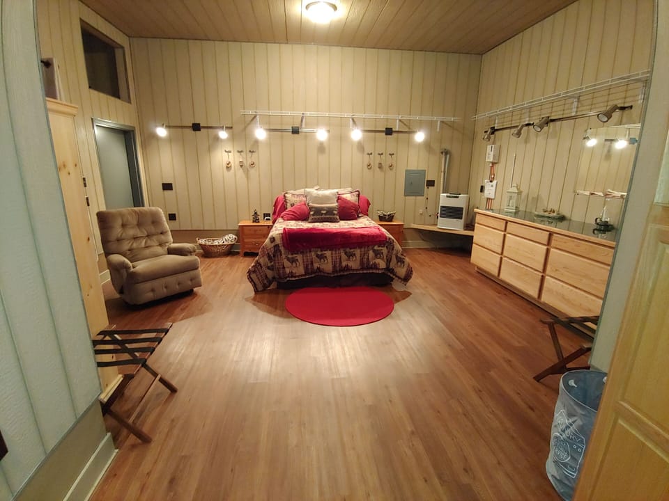 Enjoy our spacious main bedroom with queen size bed.
