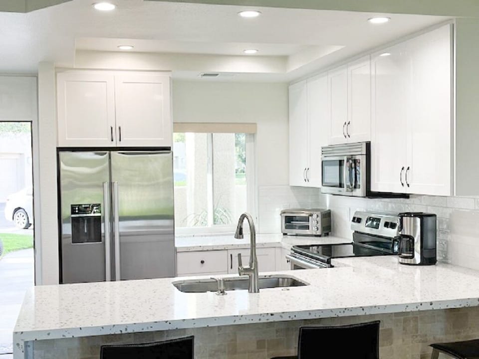 Ample cooking space with high end appliances.