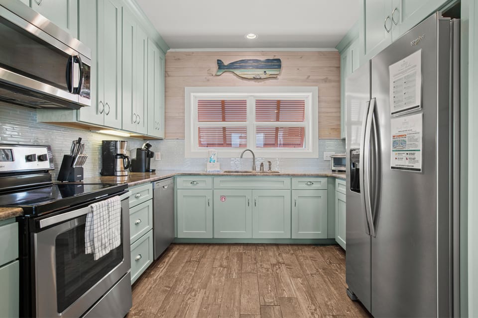 Fully equipped kitchen with stainless steel appliances