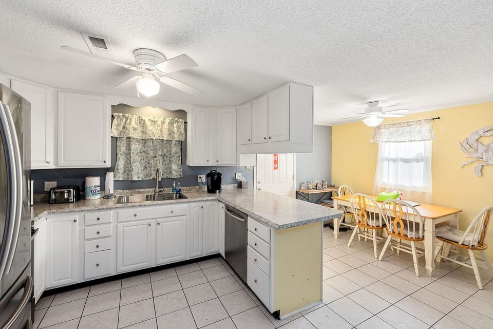 Kitchen has plenty of space to cook a favorite meal.