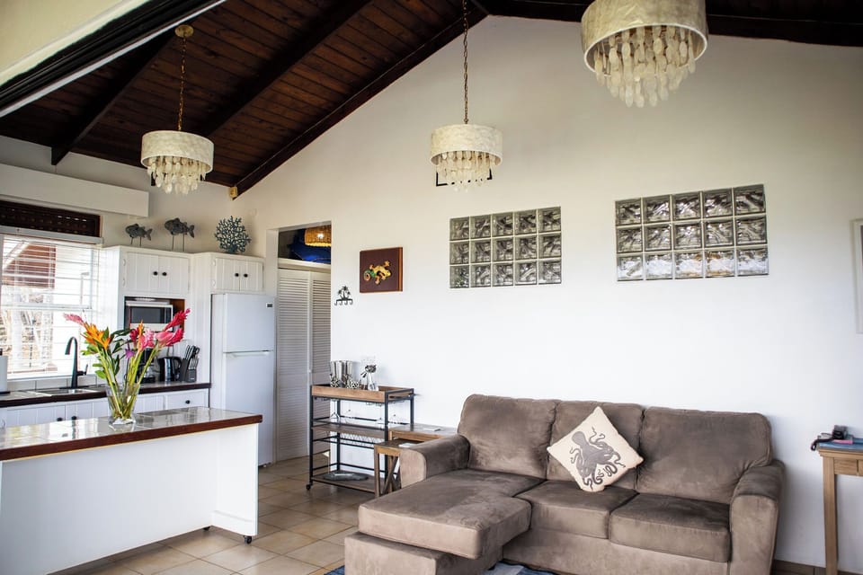 Bright, breezy, and designed for relaxation with a comfy sofa and Smart TV.