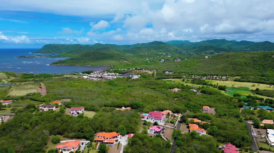 Overlooking lush golf course greens and sparkling Caribbean waters.