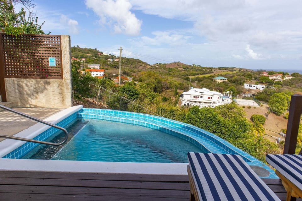 Your own private plunge pool with endless Caribbean views.