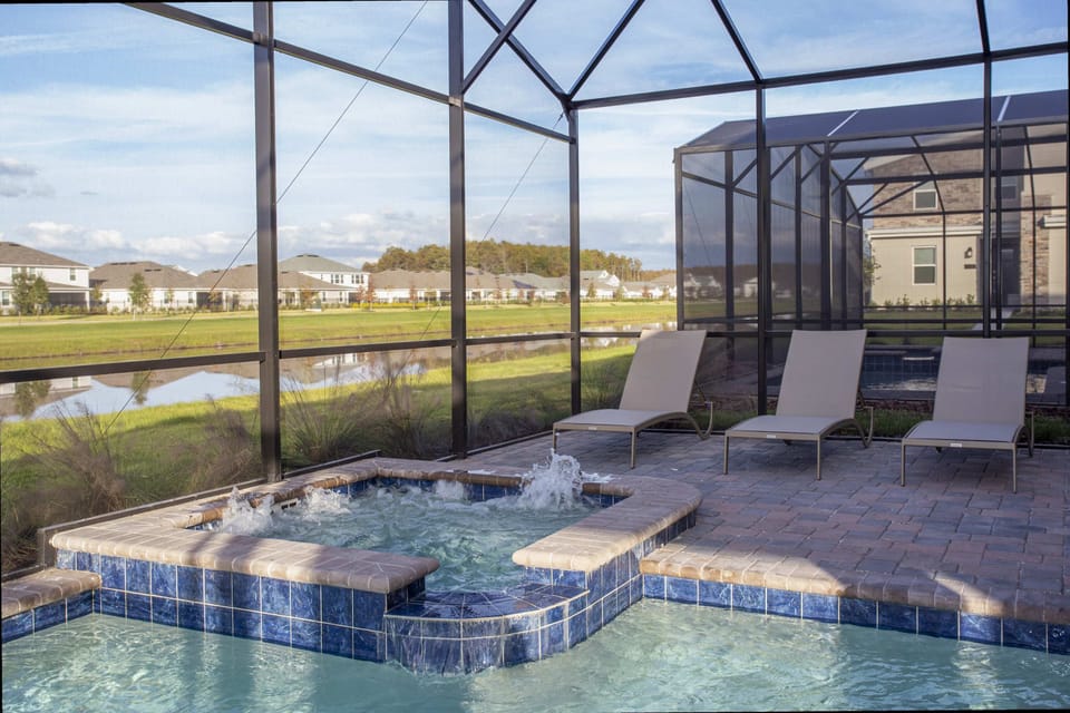 Private Pool and Spa
Lounge by the sparkling pool or soak in the spa on your screened patio oasis.