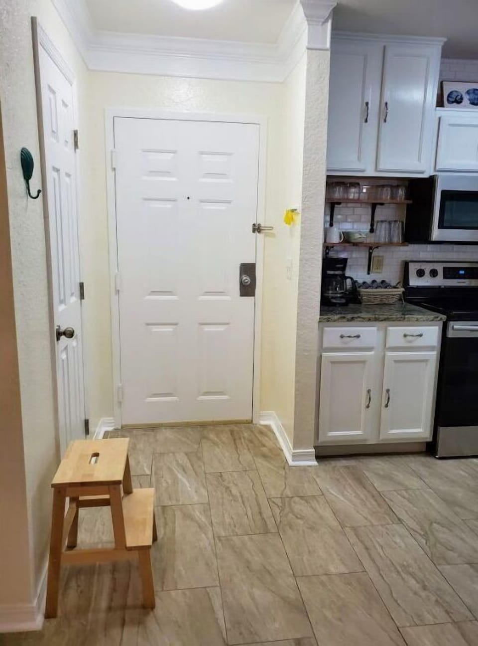 Front Door. Closet on left side is our host closet with supplies for every stay.