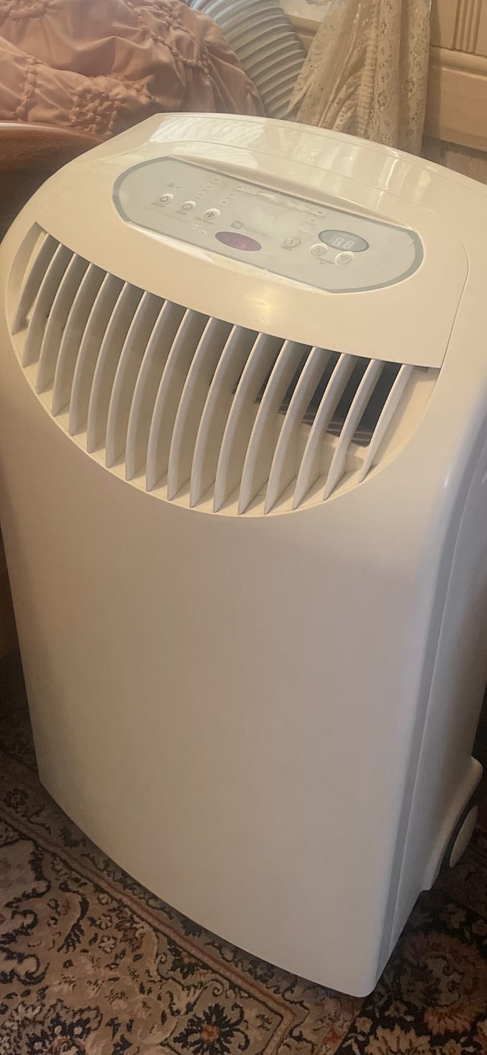 Seasonal A/C in the downstairs master bedroom. 