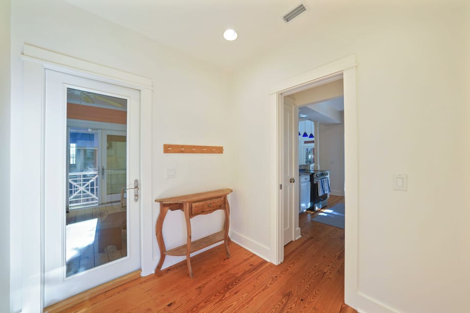 ADJACENT FOYER AND SIDE ENTRANCE TO GRILL AREA OFF KITCHEN