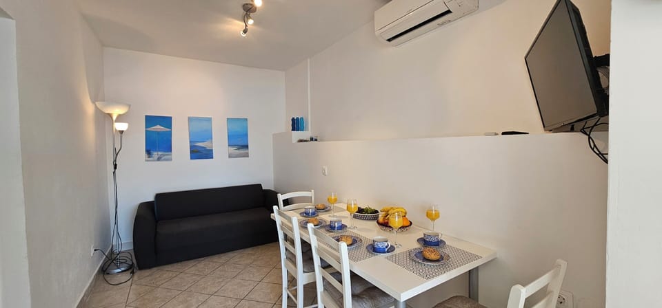 Apt 1 kitchen / dining area / living