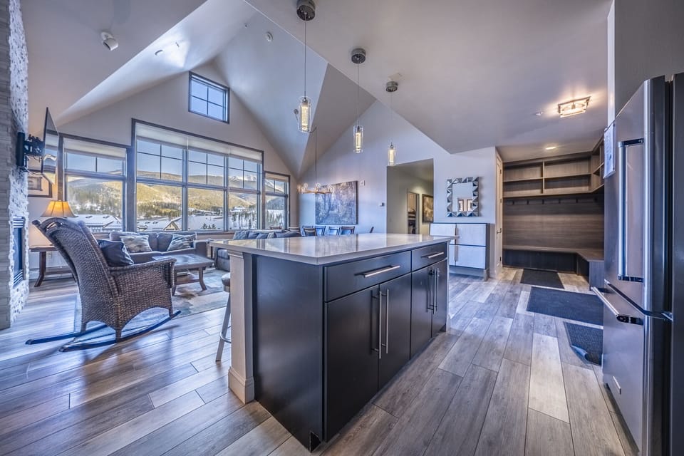 Kitchen - Breakfast nook with pendant lighting offers additional counter space for meal prep as well as additional seating.