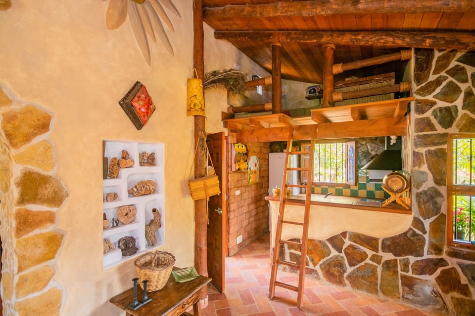 Enjoy the living room of this rural house in Guaro