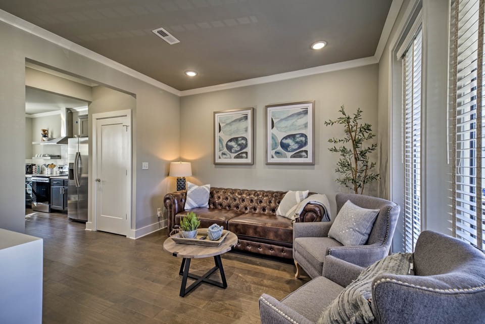 Stylish and comfortable living room with kitchen.