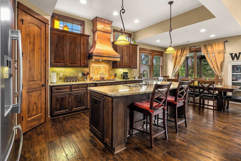 The 19th Hole - Fully stocked kitchen with granite counters and stainless appliances.