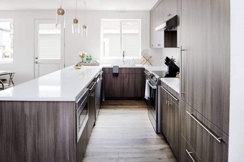 Front door , Microwave, refrigerator, stove, dishwasher, sink, fully stocked kitchen. 
