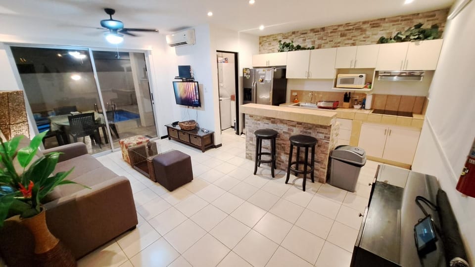 Living area with TV and sofa bed