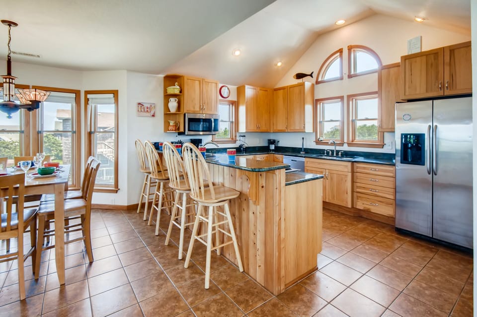 Prepare meals in the well-equipped kitchen with upscale appliances and plenty of space.
