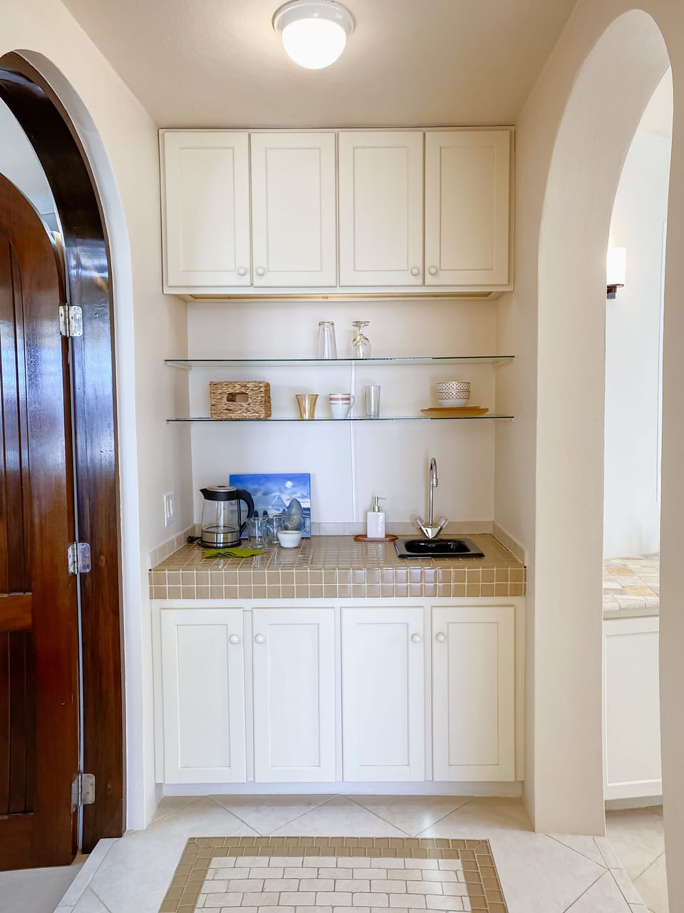 Wet bar with mini fridge and coffee station