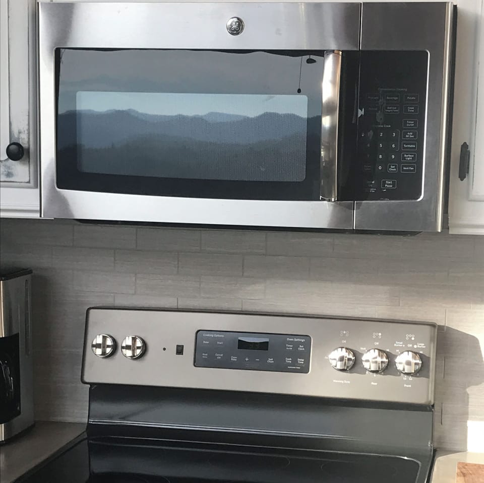Even the appliances reflect the beautiful view!