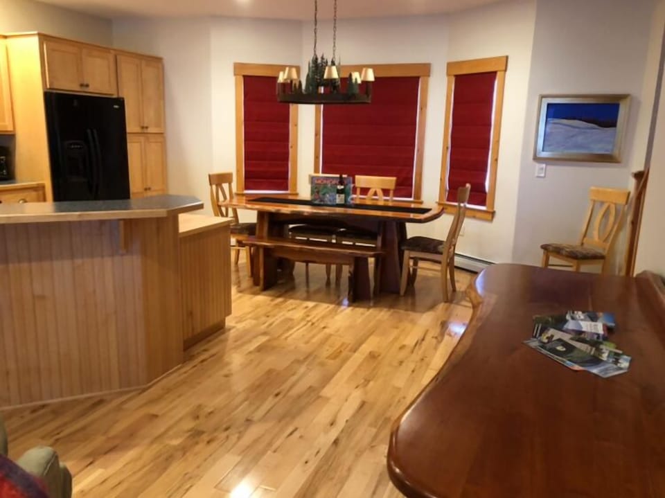 Dining area- windows with views of the valley below.