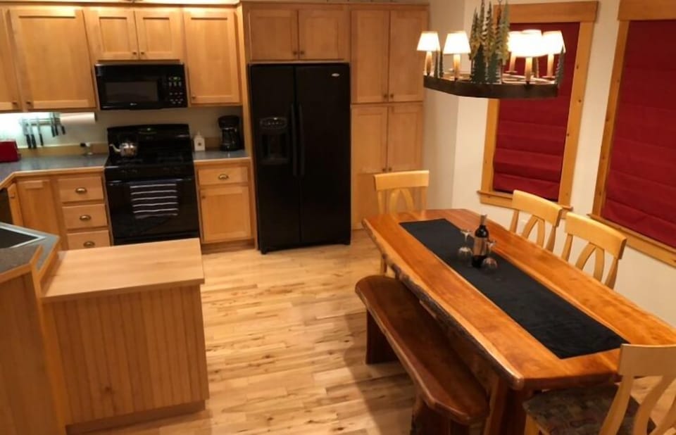 Second floor kitchen with dining area.
