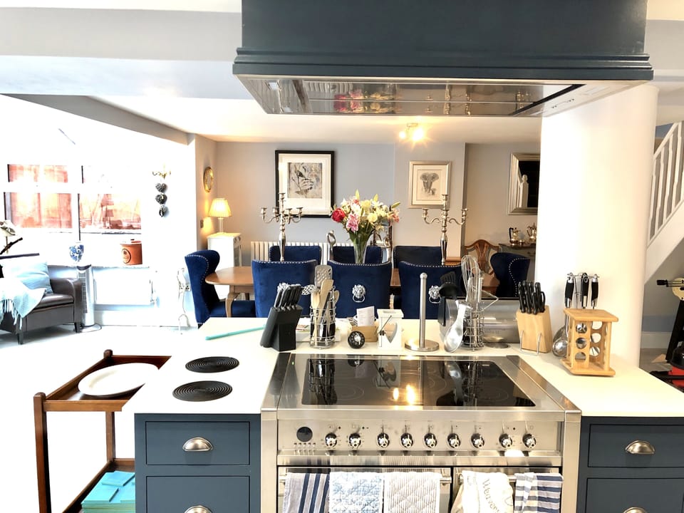 From the open plan kitchen, to the dining area..