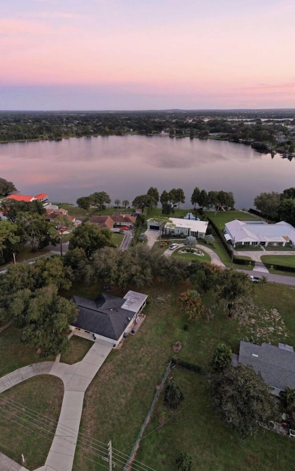 Drone view of house with horseshoe driveway (thanks to previous guest)!