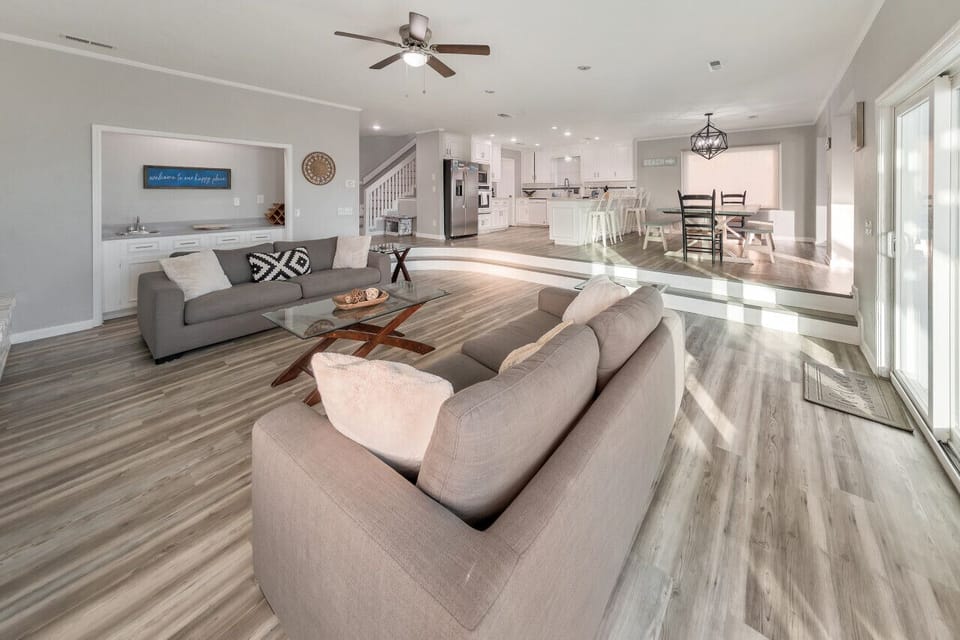 Open living and dining space with modern coastal vibes