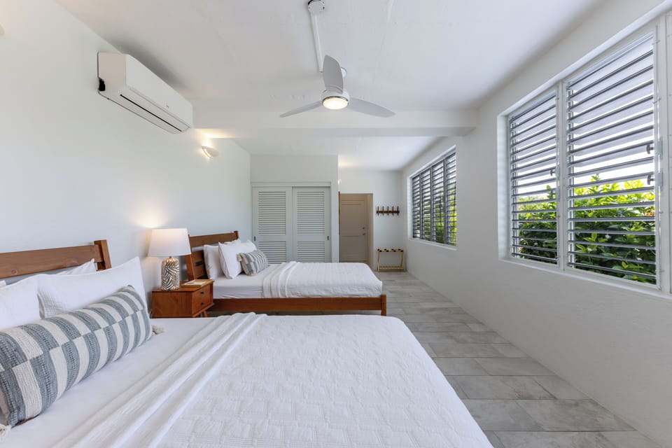 Downstairs bedroom with 2 Queen beds