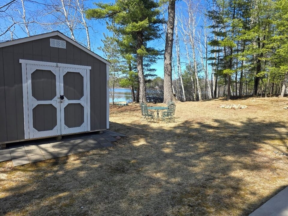 outside with small table and chairs.