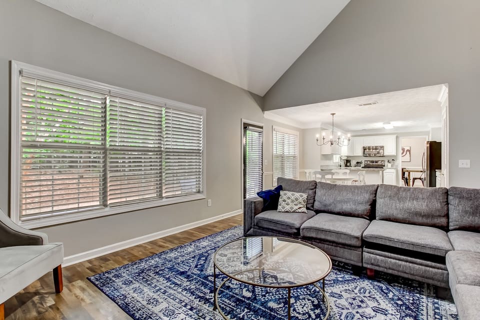 Living room with sectional and 65" TV