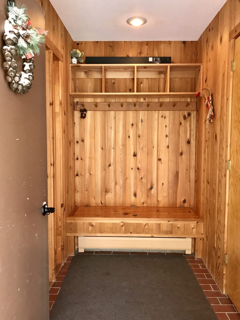 Heated entry area and closet for easy access to skis and boots