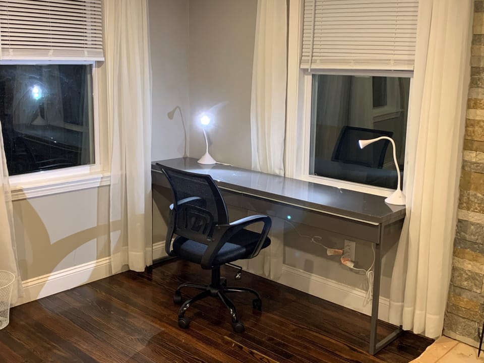 Work desk with sliding drawers and chair. 