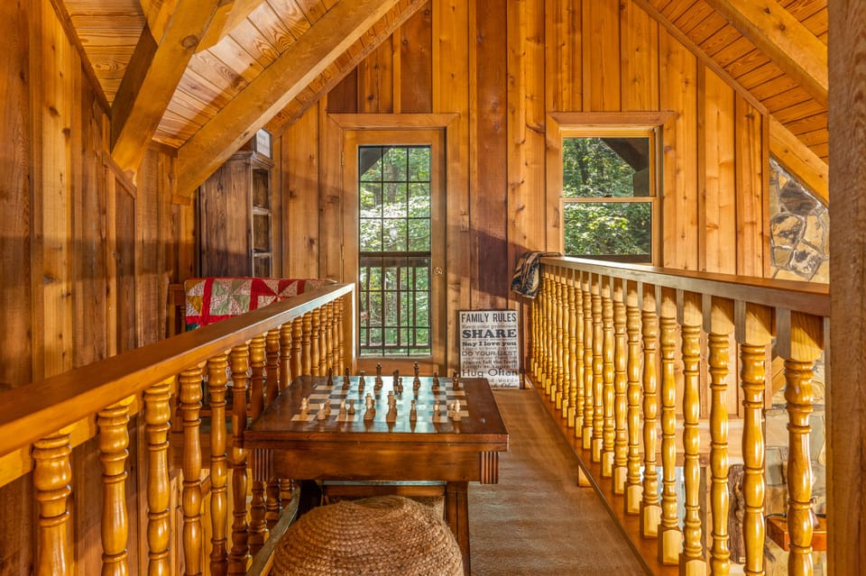 A private balcony (3rd floor) with a catwalk for hanging out.  Chess anyone?