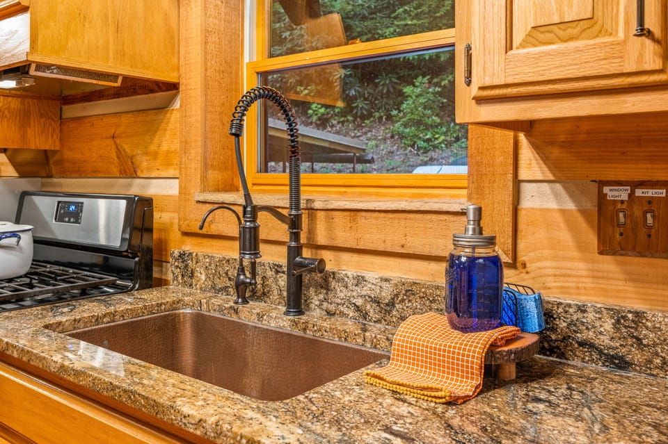 Granite countertops with copper sinks